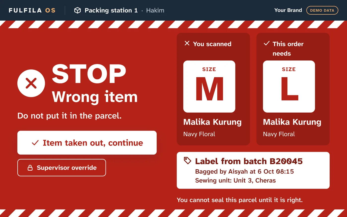 Packing station screen showing STOP, wrong item: the packer scanned size M and the order needs size L. It shows the batch, sewing unit and bagger of the wrong label.